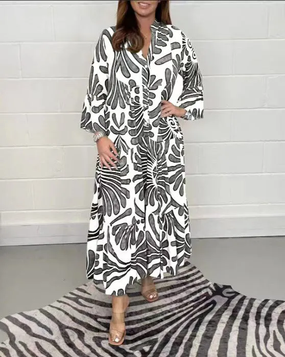 Bohemian-Inspired Flowing Maxi Dress with Bold Artistic Print