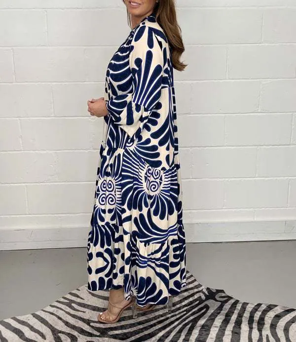 Bohemian-Inspired Flowing Maxi Dress with Bold Artistic Print