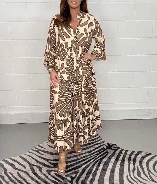 Bohemian-Inspired Flowing Maxi Dress with Bold Artistic Print