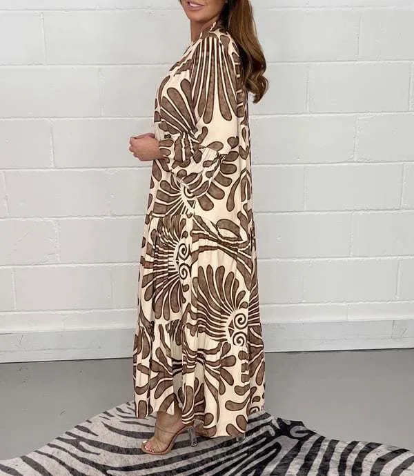 Bohemian-Inspired Flowing Maxi Dress with Bold Artistic Print