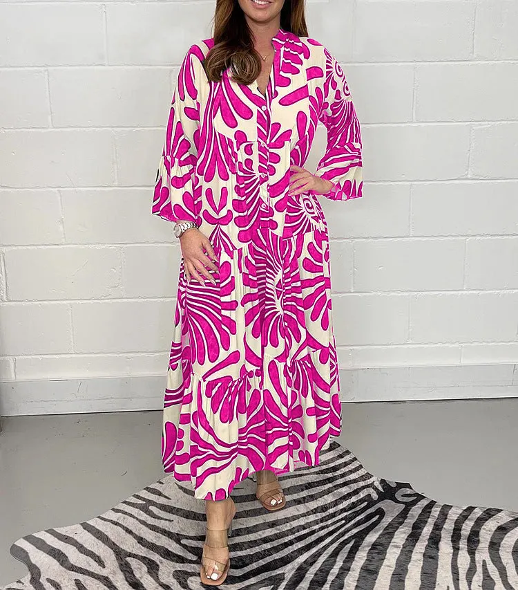 Bohemian-Inspired Flowing Maxi Dress with Bold Artistic Print