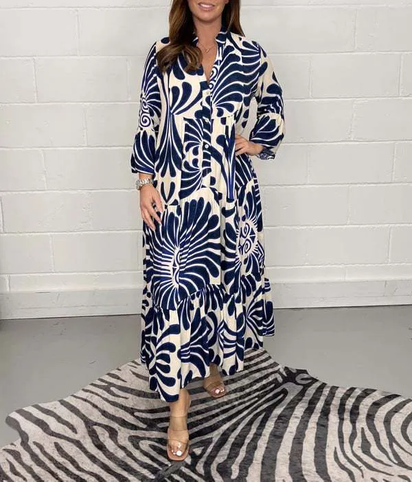 Bohemian-Inspired Flowing Maxi Dress with Bold Artistic Print