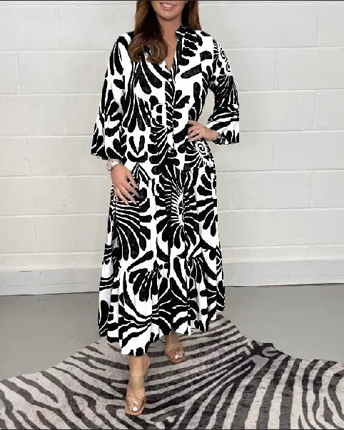 Bohemian-Inspired Flowing Maxi Dress with Bold Artistic Print