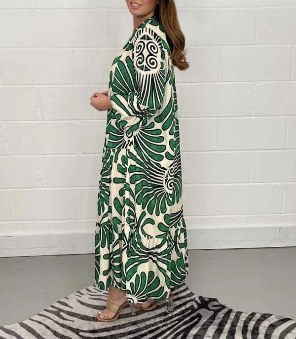 Bohemian-Inspired Flowing Maxi Dress with Bold Artistic Print