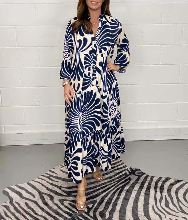 Bohemian-Inspired Flowing Maxi Dress with Bold Artistic Print