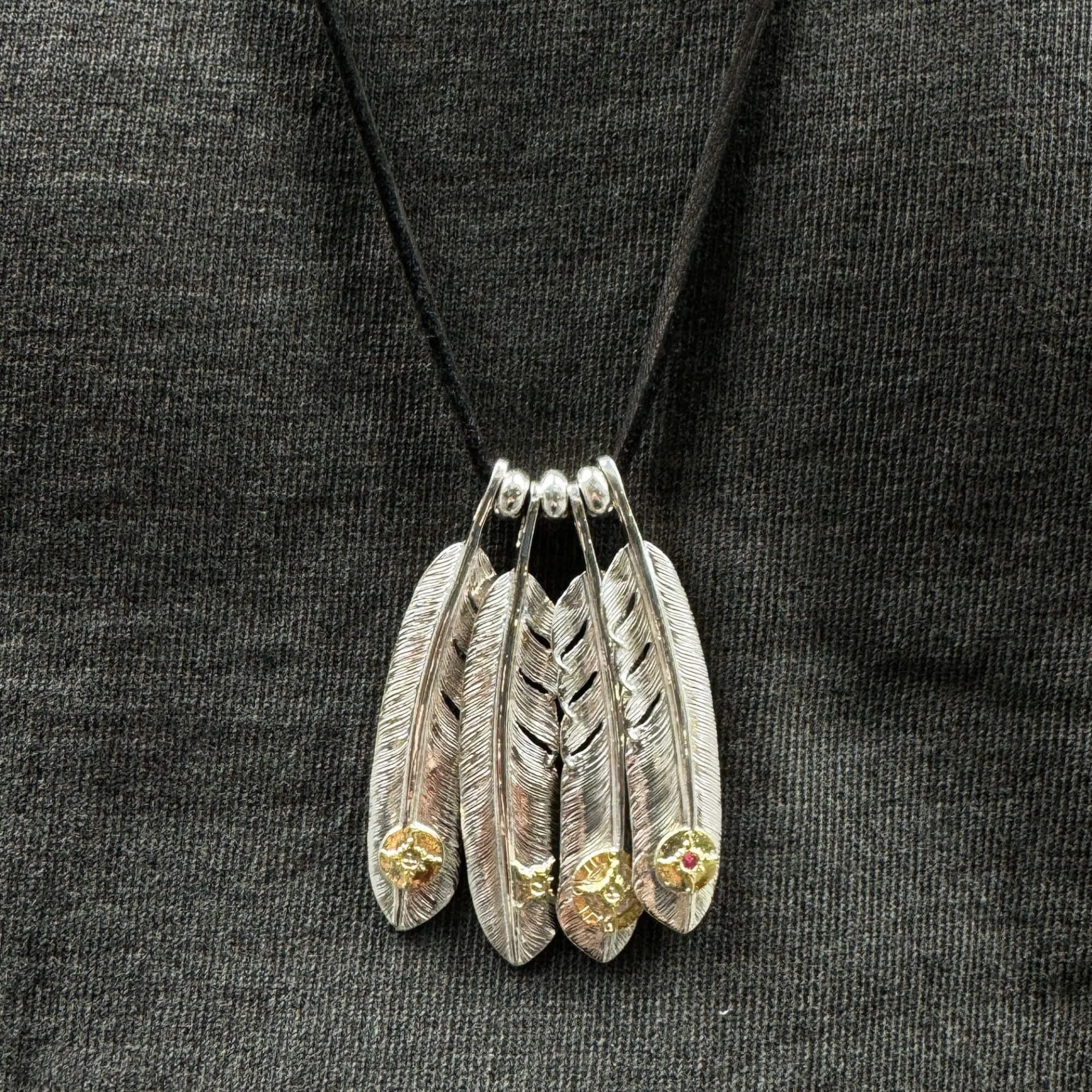 First-Arrow's Large Silver Feather With 18k Sunburst Emblem