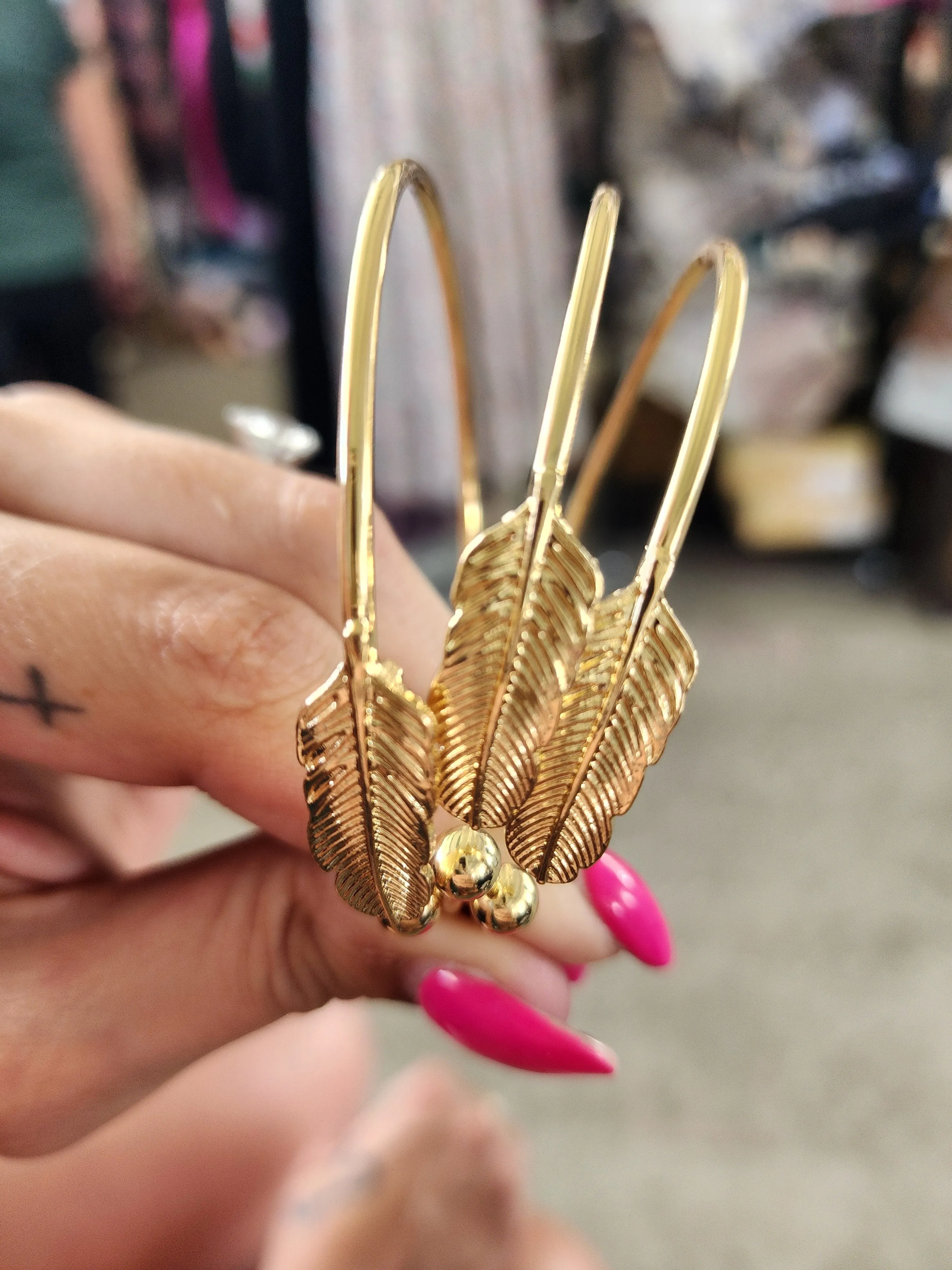Gold feather cuff bracelet