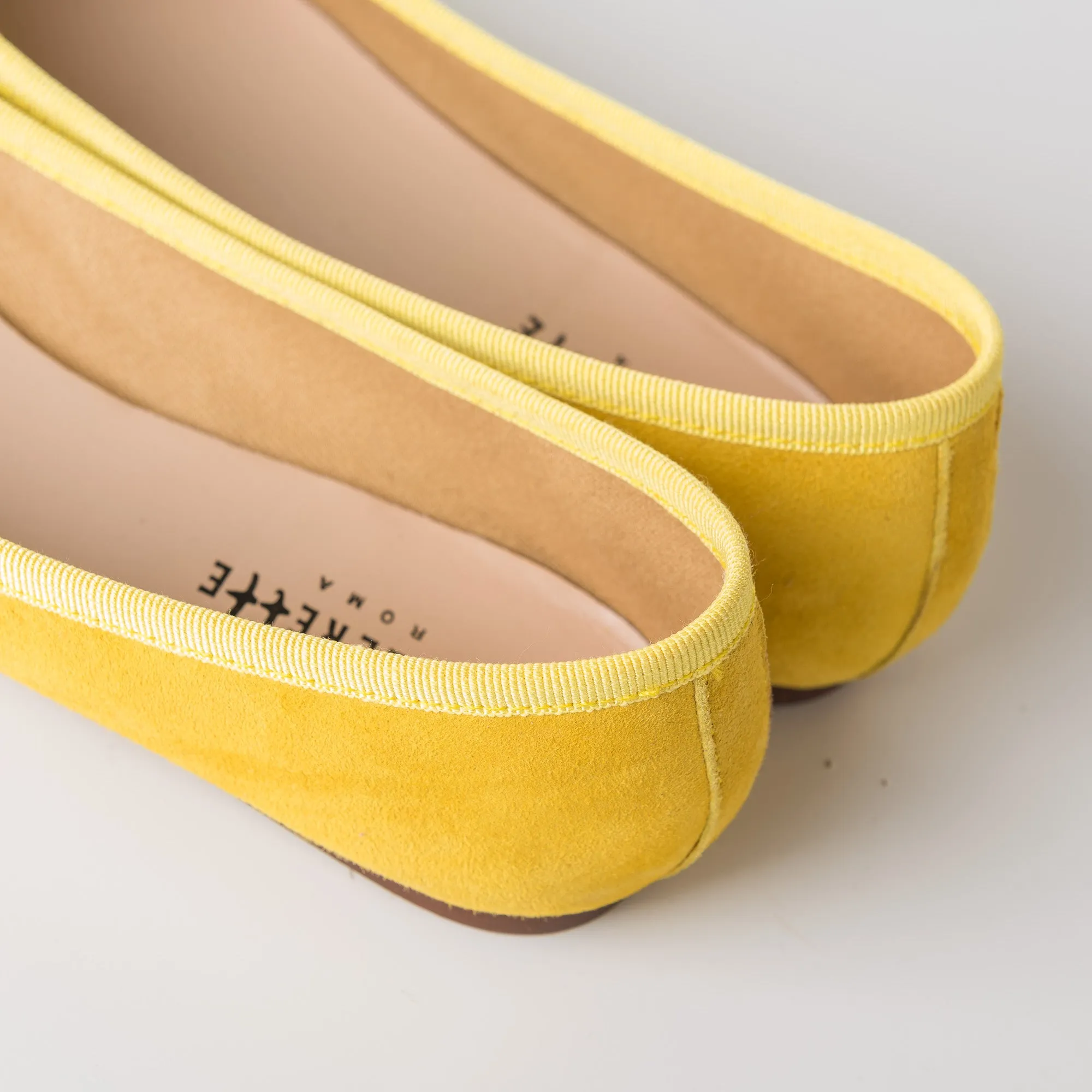 Yellow suede ballet flats