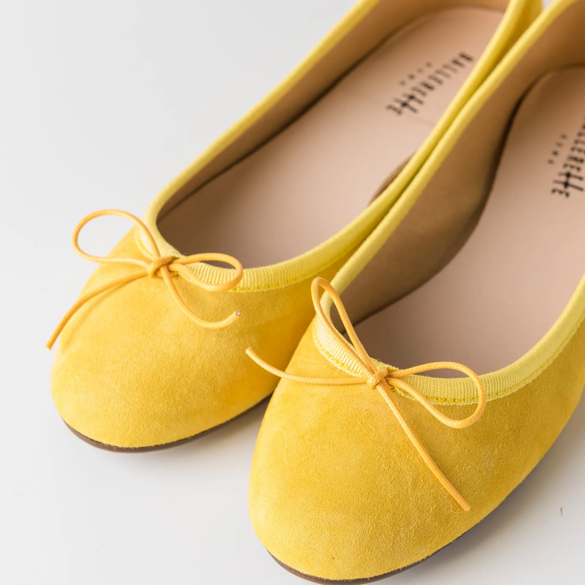 Yellow suede ballet flats